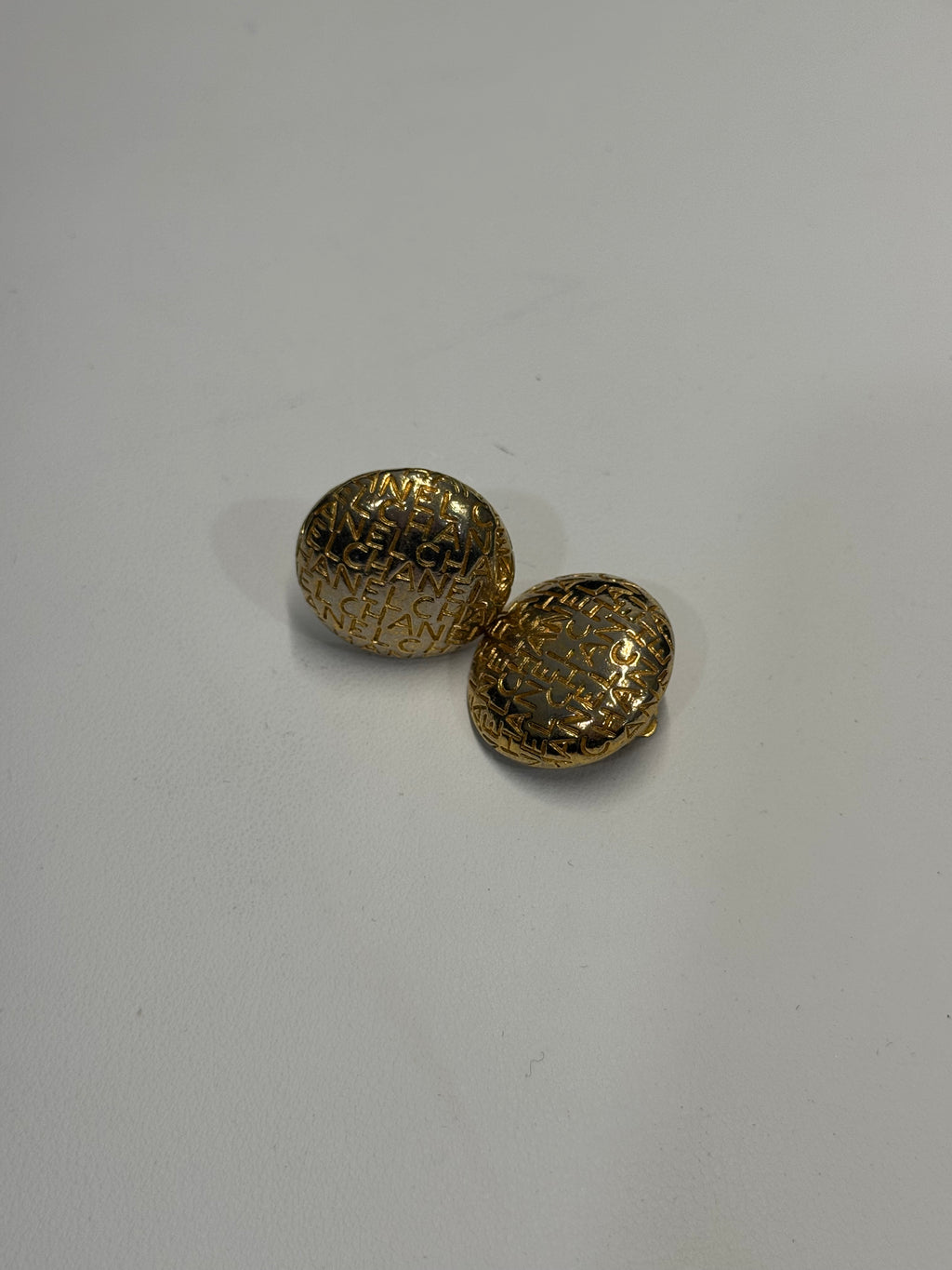 Chanel all over button stud